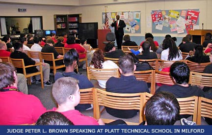 Judge Peter L. Brown speaking at Platt Technical School in Milford