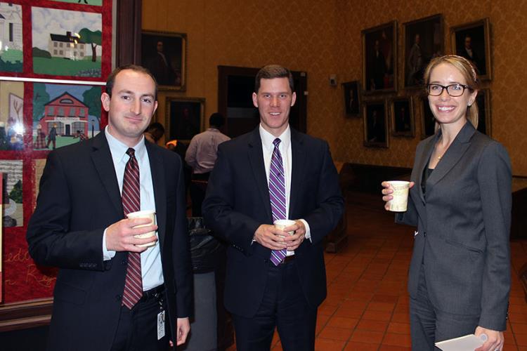 Matt Berardino of Judicial Branch External Affairs (left) with Supreme Court law clerks Evan O’Roark and Sarah Kettenmann.