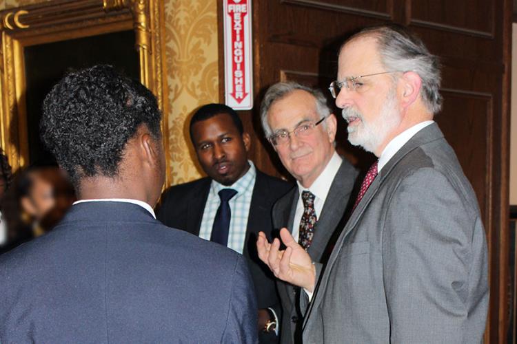Supreme Court Justice Peter Zarella (right) discusses the impact of the <i>Magna Carta</i> on the law with area high school students. Attorneys Wes Horton (center) and Anthony Shannon joined in.