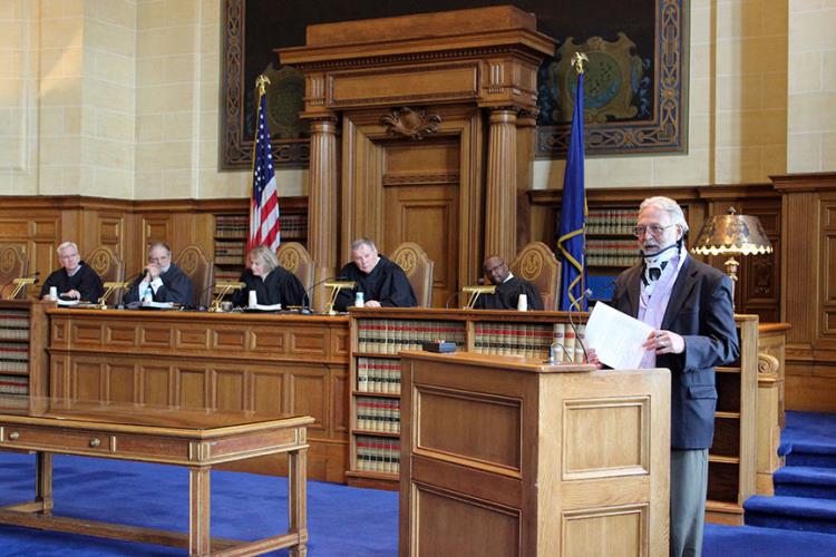 Attorney Mark A. Dubois, President of the Connecticut Bar Association, addressed those in attendance about the influence of the <i>Magna Carta</i> on law today.