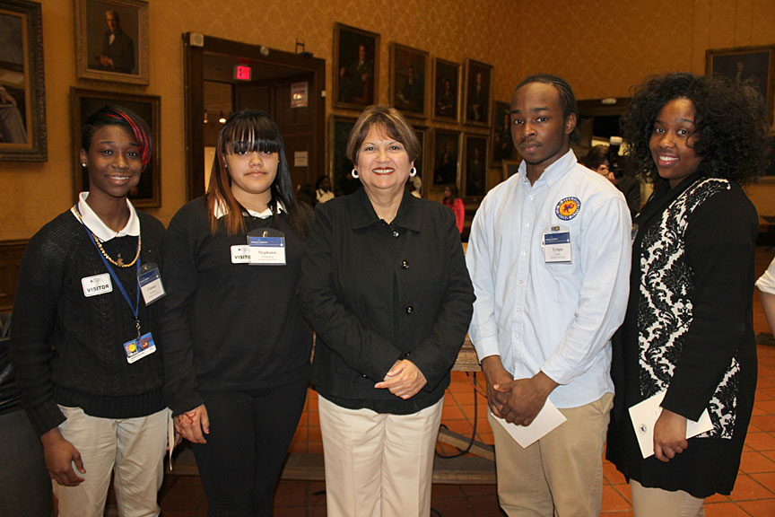 Students from Hartford and Bloomfield pose with Associate Justice Carmen E. Espinosa.