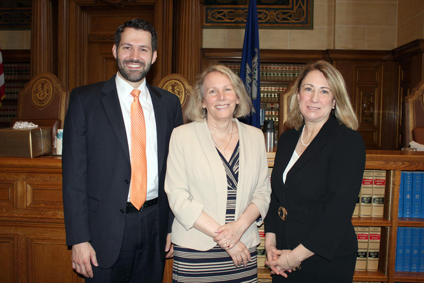 Dr. Spencer, Chief Justice Chase T. Rogers and Attorney Knox pose for a picture.