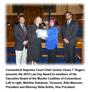 Chief Justice Rogers gives award to Muslim Coalition