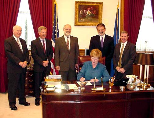 Chief Justice William J. Sullivan, Attorney Alan Lieberman, Attorney Chuck Howard; Justice Peter T. Zarella; and Attorney Greg D'Auria. Sitting: Governor M. Jodi Rell.