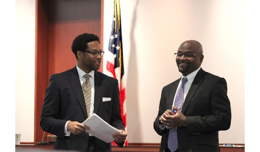 Troy Brown, Judicial Branch Training Academy Supervisor (left) and Associate Supreme Court Justice<br>Richard A. Robinson during their lecture on <em>Understanding Implicit Bias.</em>