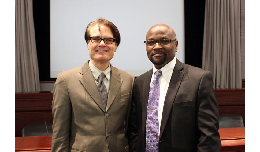 Yale Professor of Law and Psychology Dan M. Kahan (left) and Associate Supreme Court Justice Richard A. Robinson<br>at the opening ceremonies of the Judicial Branch Diversity Week.