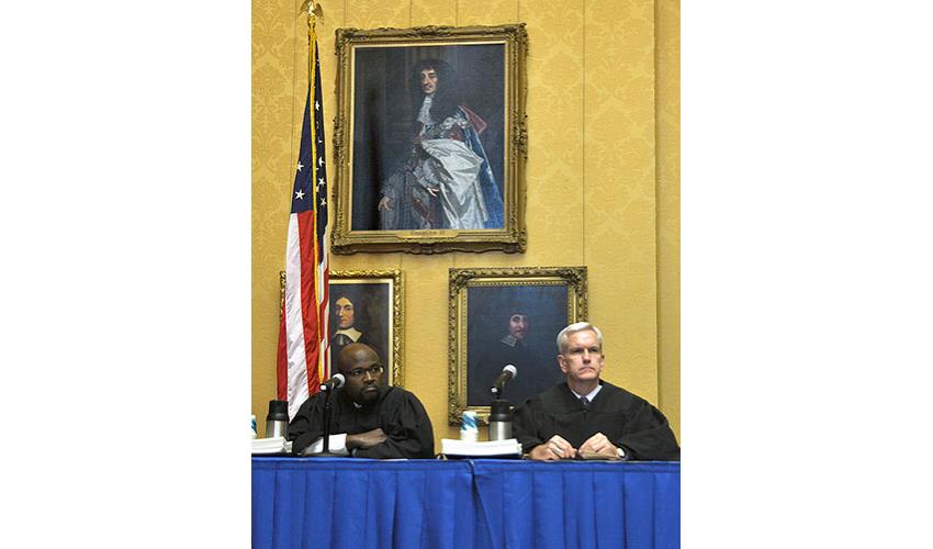 Justice Richard A. Robinson (L) and Justice Andrew J. McDonald.