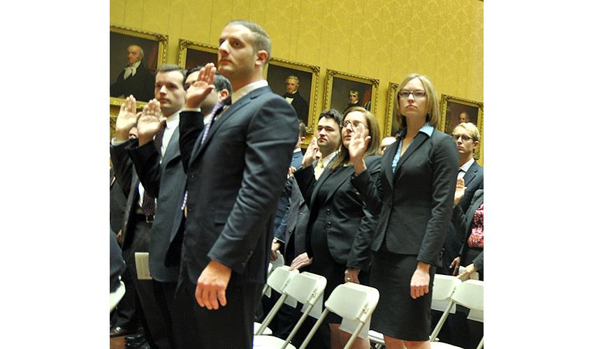 A group of new attorneys take their oath.